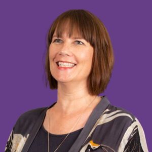 helen saunders headshot against a purple background